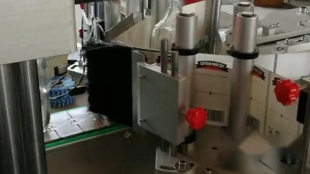 Machine d'étiquetage manuelle automatique d'étiquettes de bouteille ronde/carrée de beurre d'arachide de boisson laitière, machine d'étiquetage de positionnement d'autocollant, machine d'étiquetage de manchon rétractable de colle humide